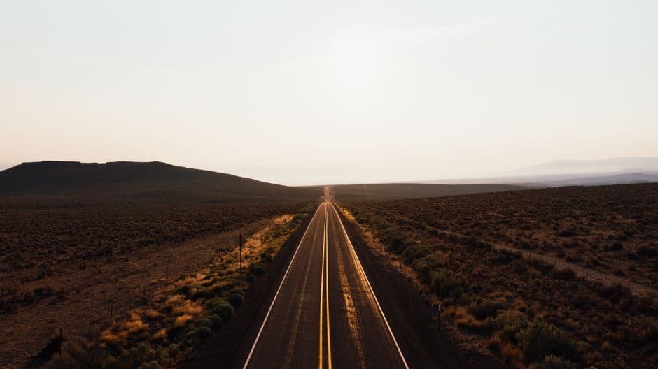 Sunrise over an open road